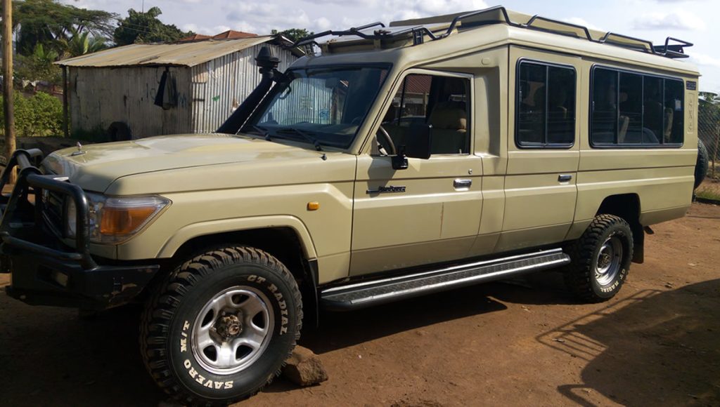 extended safari land cruiser with pop up roof with seating capacity From 1passenger to 7 passengers