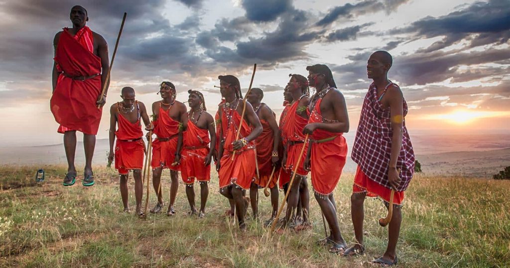 maasai-warriors jump dancing Serengeti Tanzania. 