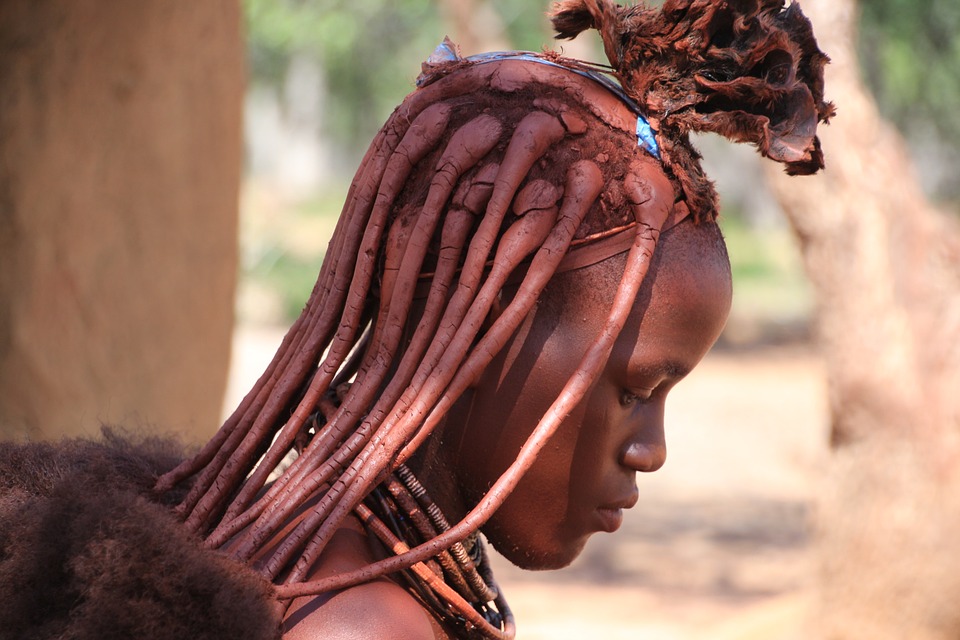 Himba woman from braiding Her hair