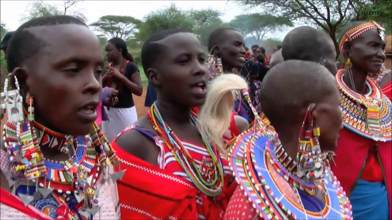 Maasai women dressed colorful for a ceremony.