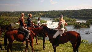 horseback riders viewing the Nile in jinja Uganda