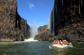 Tourists rafting through Zambezi gorge Zimbabwe