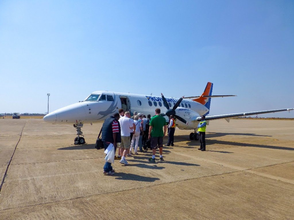 Tourists boarding a flight to Lusaka Zambia